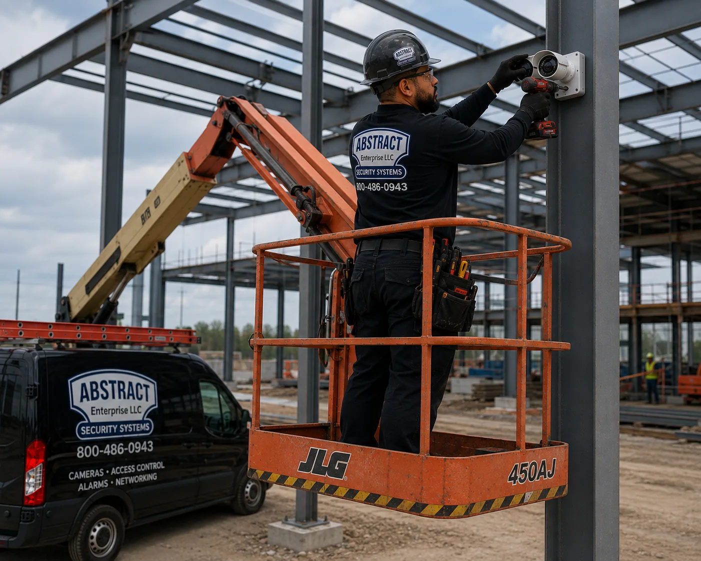 Technician mounting a bullet camera on a steel column from a boom lift inside a wide structural frame during a commercial jobsite camera installation in Manhattan