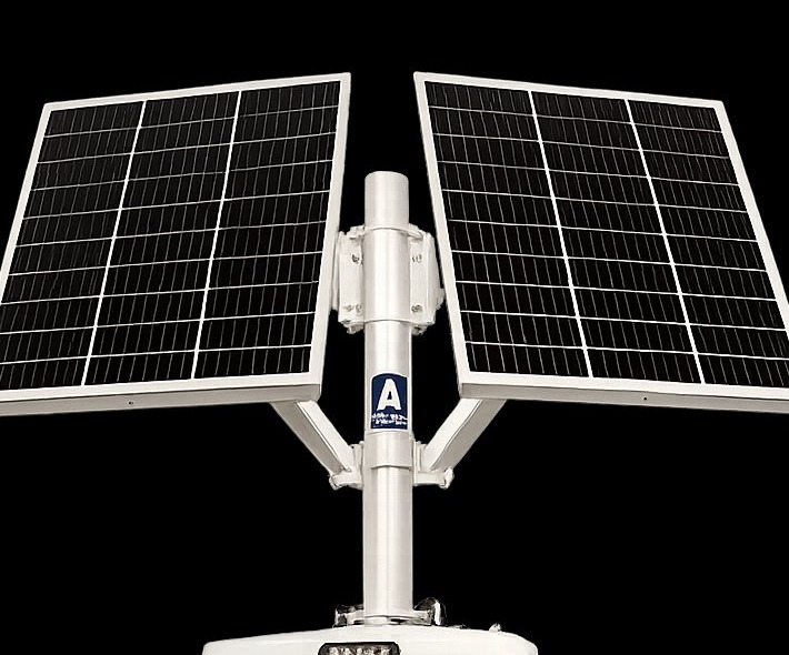 Abstract Enterprises permanent solar surveillance tower — dual-panel solar array, integrated cabinet, heavy-duty fixed installation
