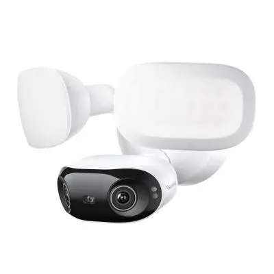 Wireless camera installation NYC: product photo of a white floodlight camera with a curved light panel, a round motion sensor and a wide black camera body below